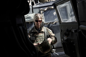 Afghanistan - Lieutenant Ramona Galletta gets in a Lince harmoured vehicle in Herat. Il tenente Ramona Galletta sale a bordo di un veicolo blindato Lince nella base di Herat